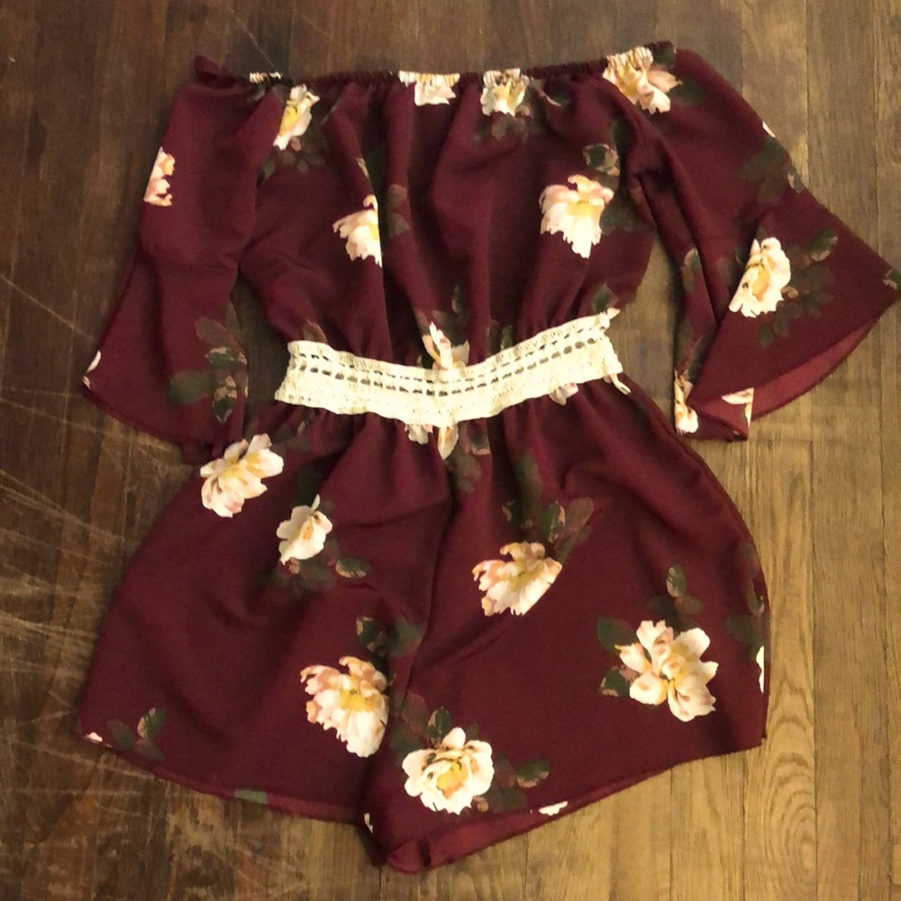 Maroon flower off the shoulder romper.